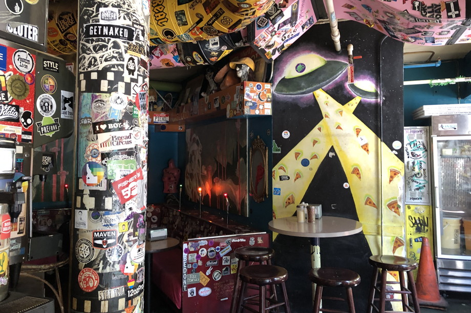 Restaurant interior in many colors, covered in stickers