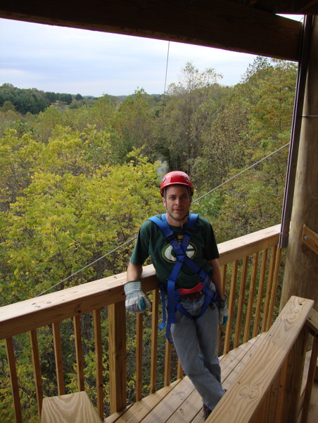 Me standing on a tower with trees behind and below me