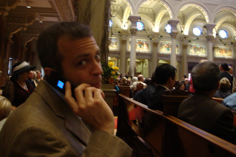 Me sitting in a church, talking on a phone