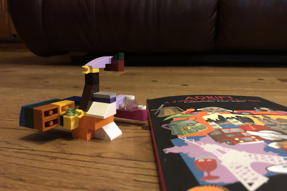 An extremely cool abstract Lego horse, matching the color scheme of the book cover